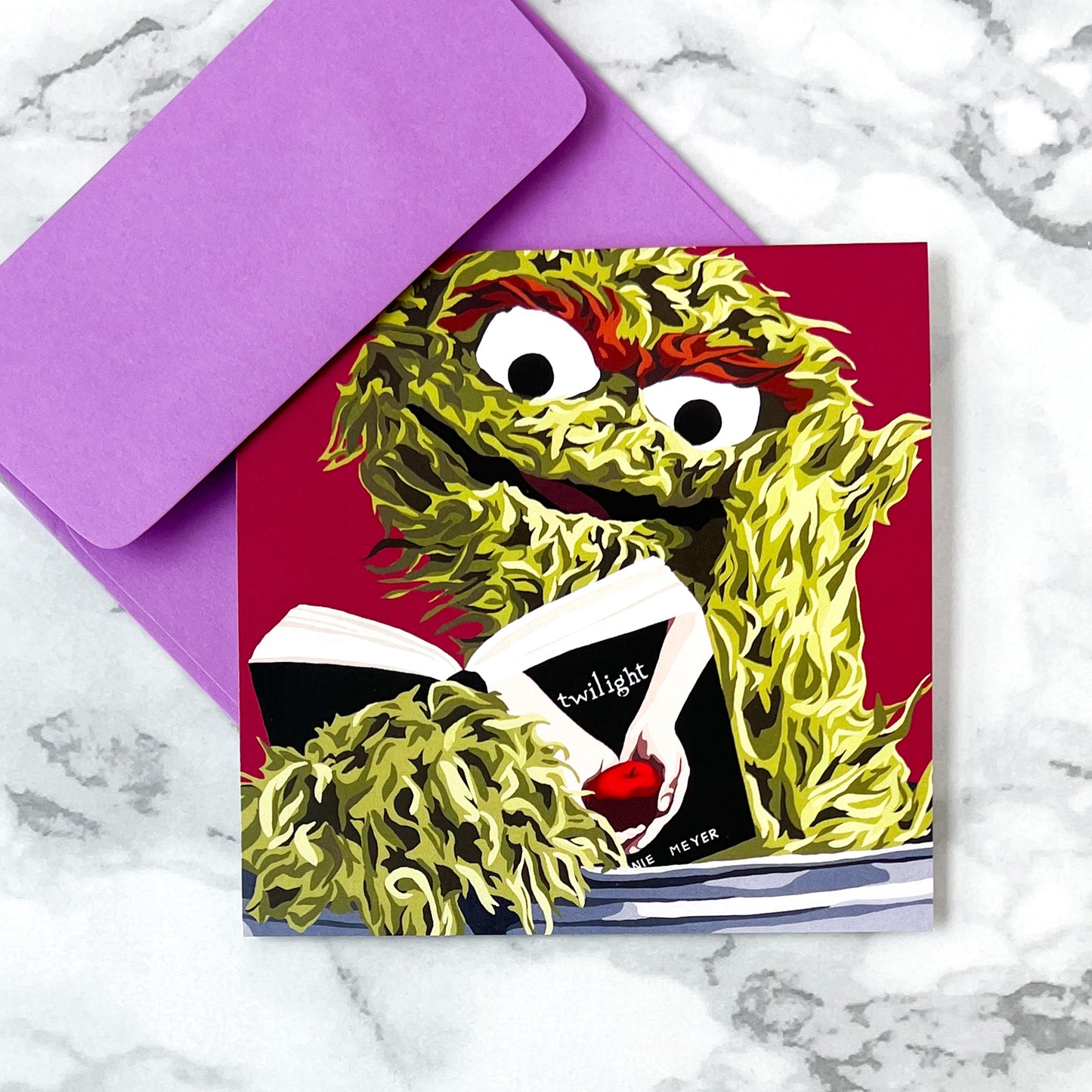 Blank greeting card - Oscar reading Twilight