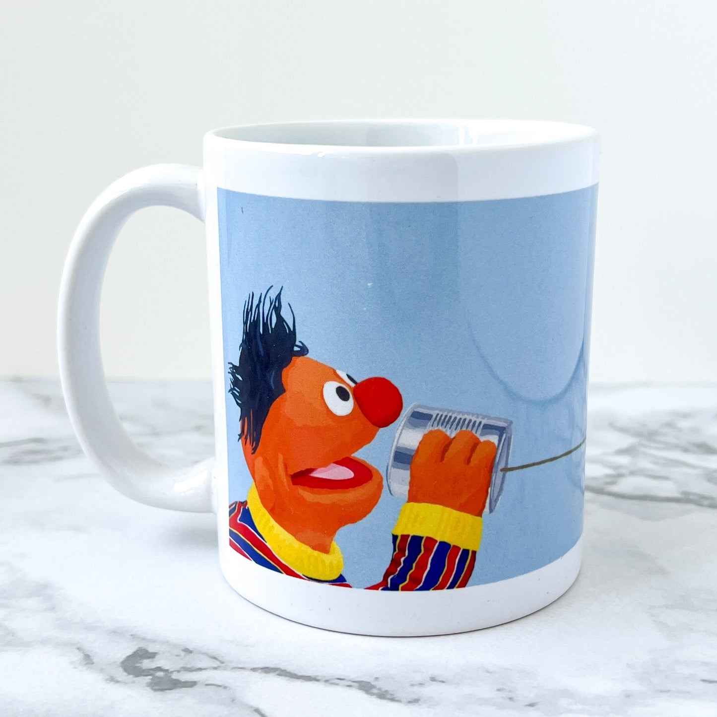 E and B with tin can telephone 11oz mug