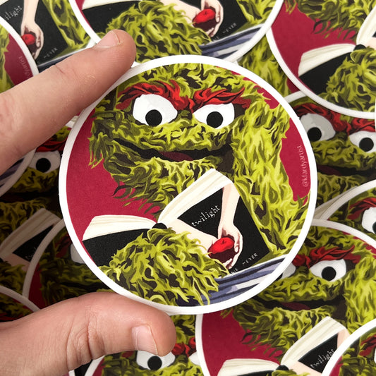 A grouch reading ‘trash’ round 3" sticker