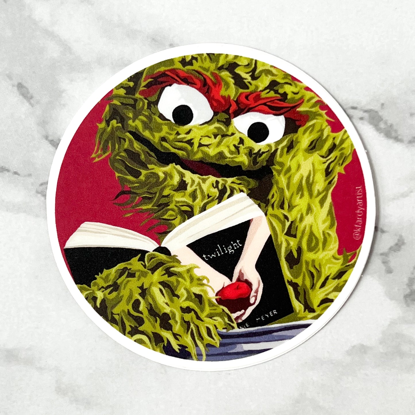 A grouch reading ‘trash’ round 3" sticker