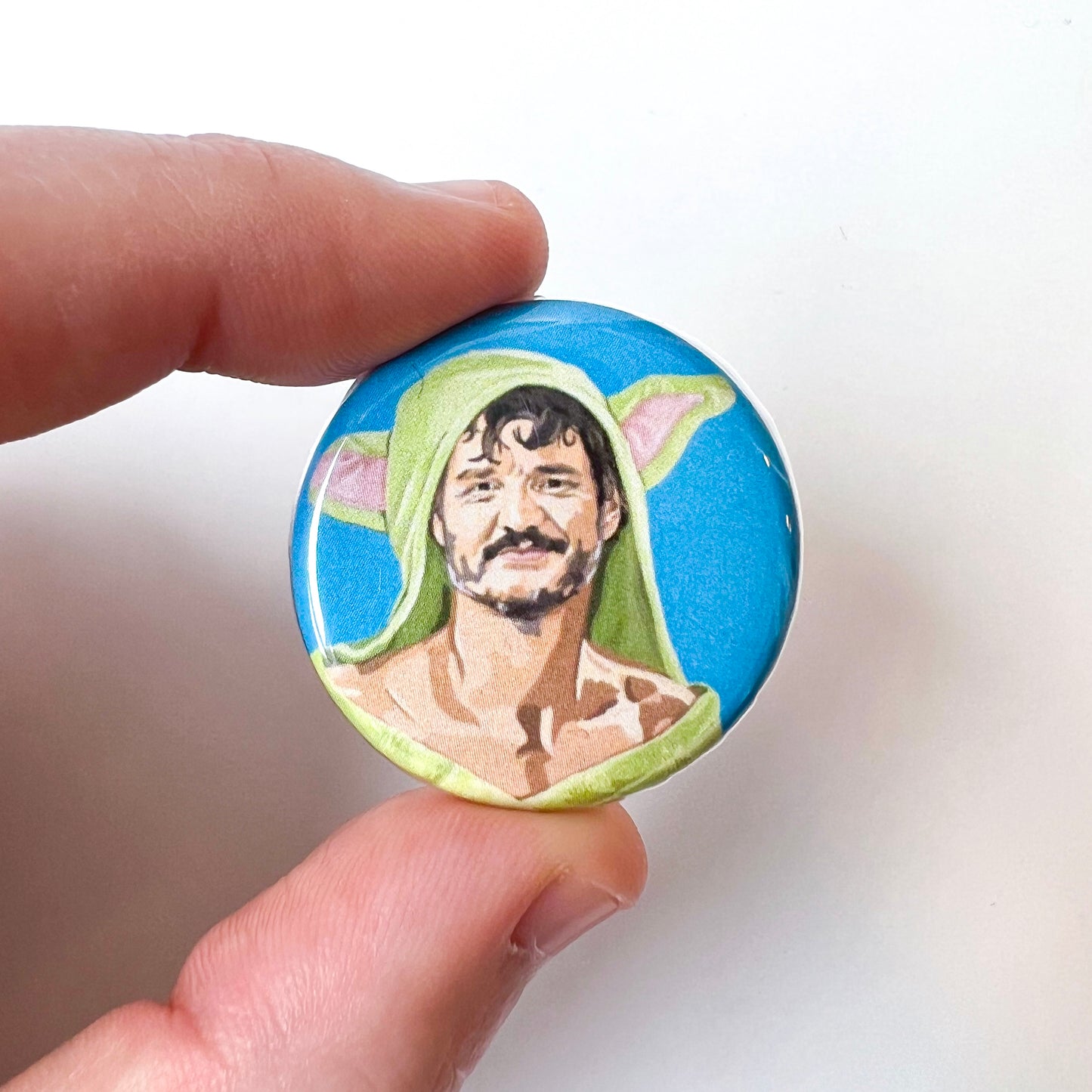 Pedro Pascal 1.25" fridge magnet