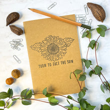 Load image into Gallery viewer, Turn To Face The Sun hand-stamped sunflower notebook/sketchbook (blank, lined, or dot grid)
