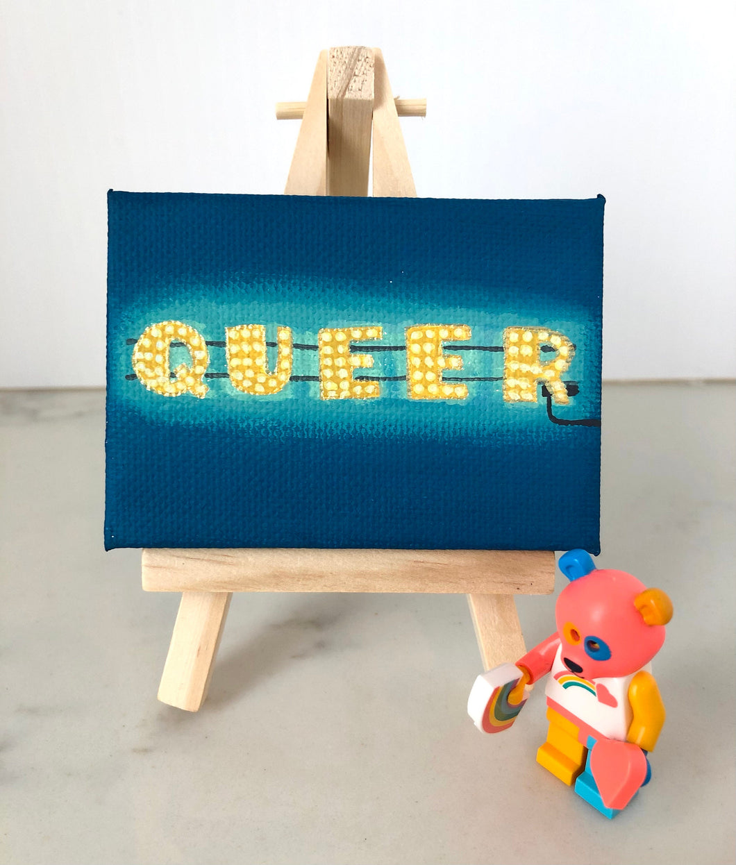 Miniature painting on easel - Queer, gold on blue